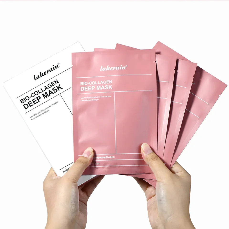 Hands holding multiple Lakerain Bio-Collagen Deep Hydration Mask packets in pink and white packaging